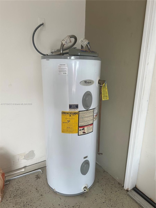 utility room featuring electric water heater