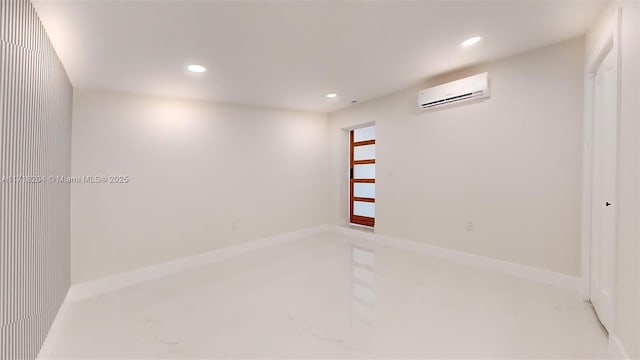 empty room featuring a wall mounted air conditioner