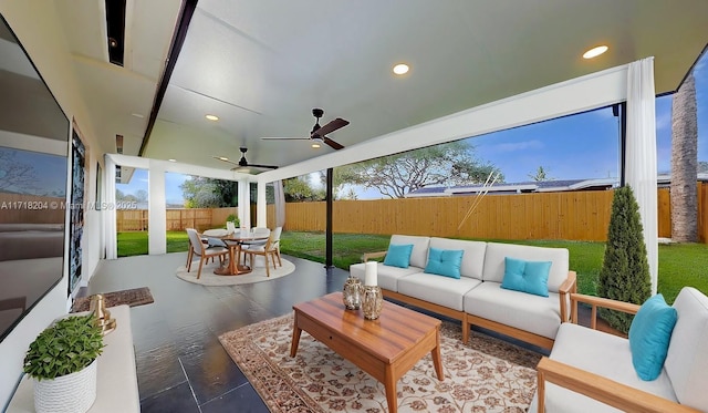 view of patio / terrace with ceiling fan and outdoor lounge area