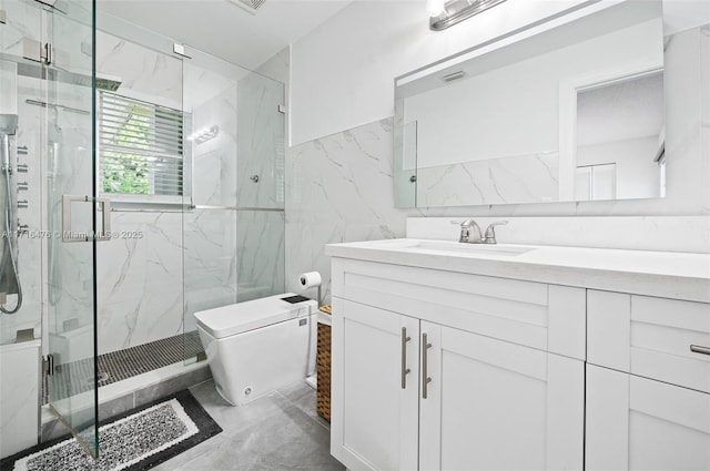 bathroom featuring vanity, a shower with shower door, and toilet