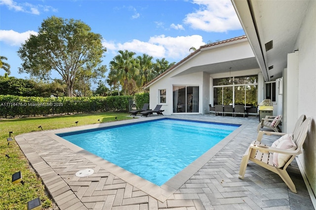 view of pool with a patio area