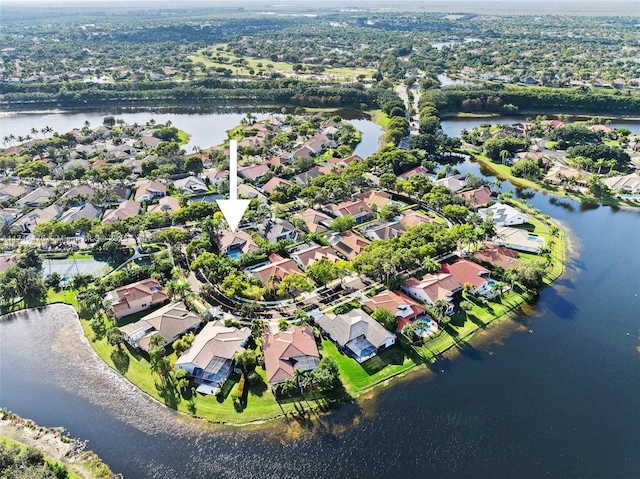 drone / aerial view with a water view