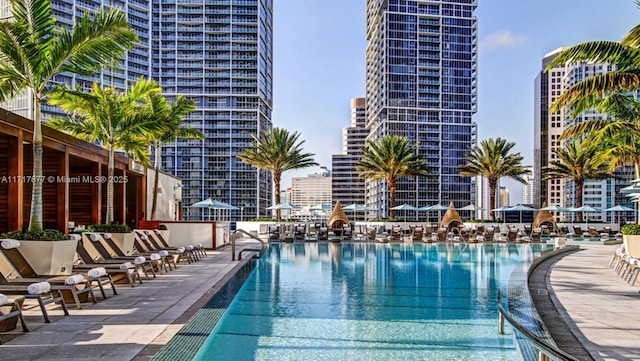 pool with a patio and a view of city