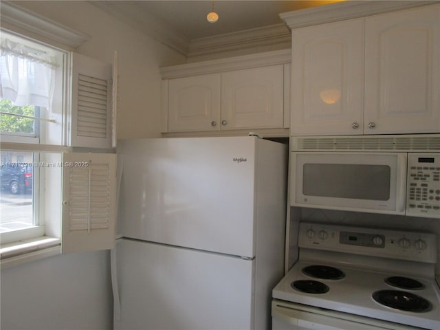 kitchen featuring white cabinets, white appliances, and crown molding