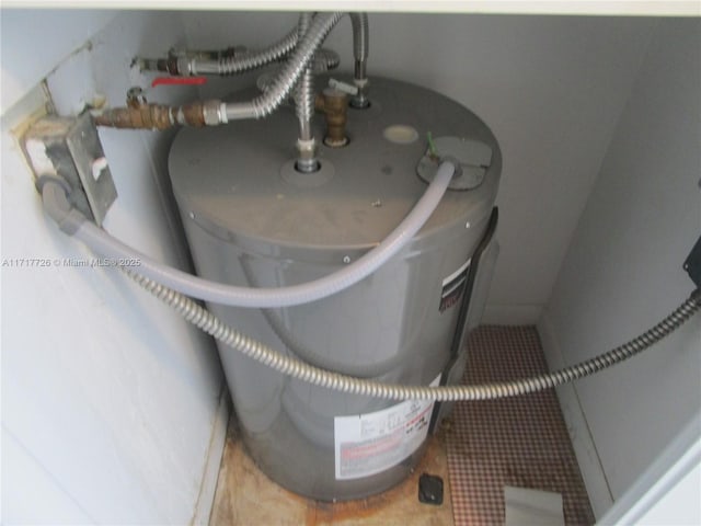 utility room with water heater