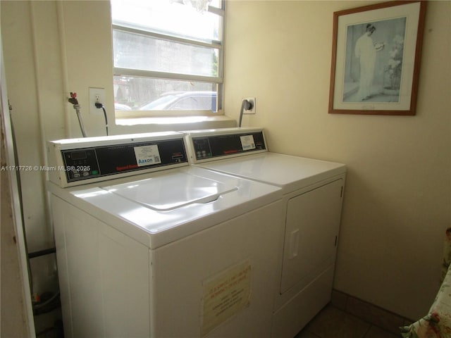 washroom with washer and dryer