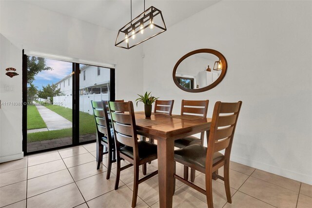 dining room featuring light tile patterned flooring