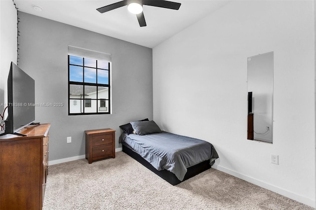 bedroom with ceiling fan and light colored carpet