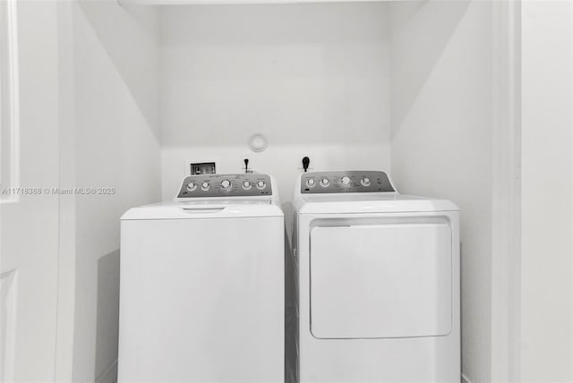 laundry area featuring independent washer and dryer