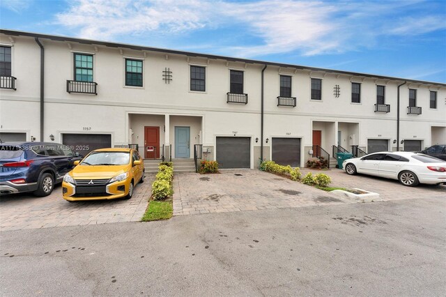 view of property featuring a garage