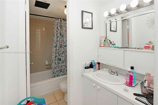 full bathroom featuring vanity, tile patterned flooring, toilet, shower / bathtub combination with curtain, and a textured ceiling