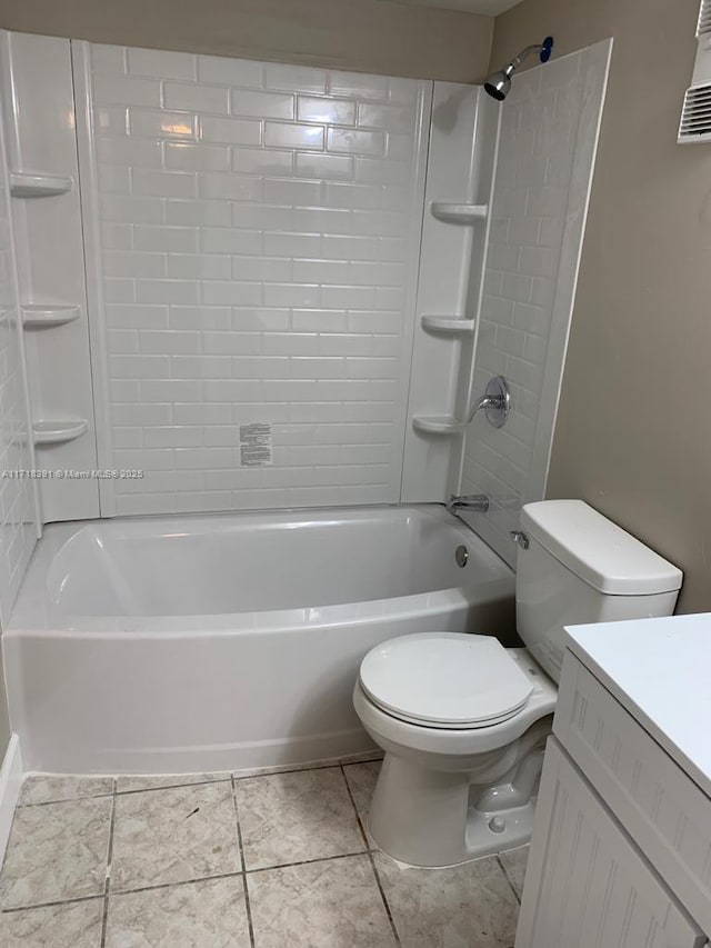 full bathroom featuring vanity,  shower combination, toilet, and tile patterned flooring