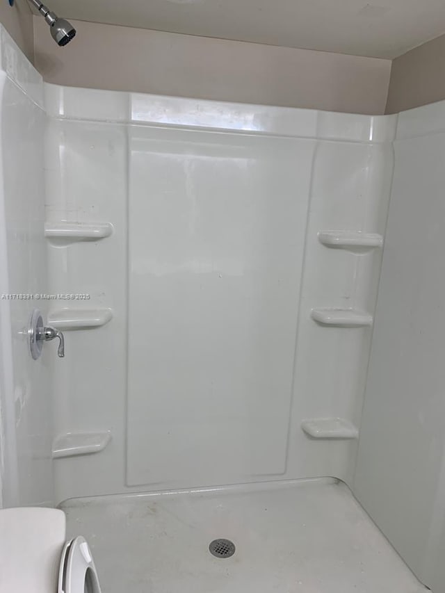 bathroom with a shower