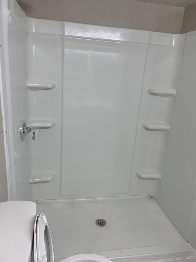 bathroom with walk in shower