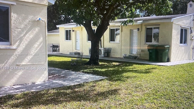 exterior space featuring a front yard