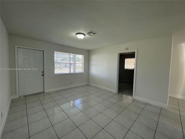 view of tiled spare room