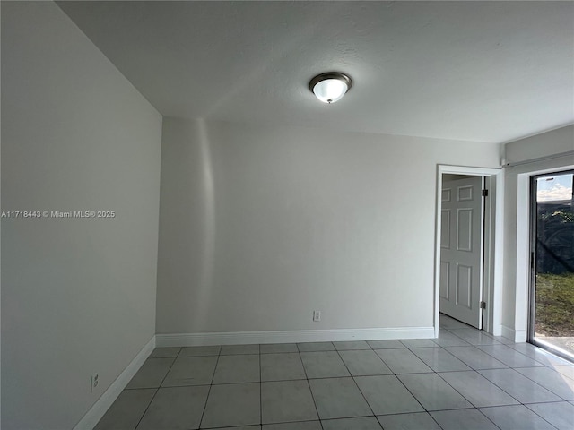 view of tiled spare room