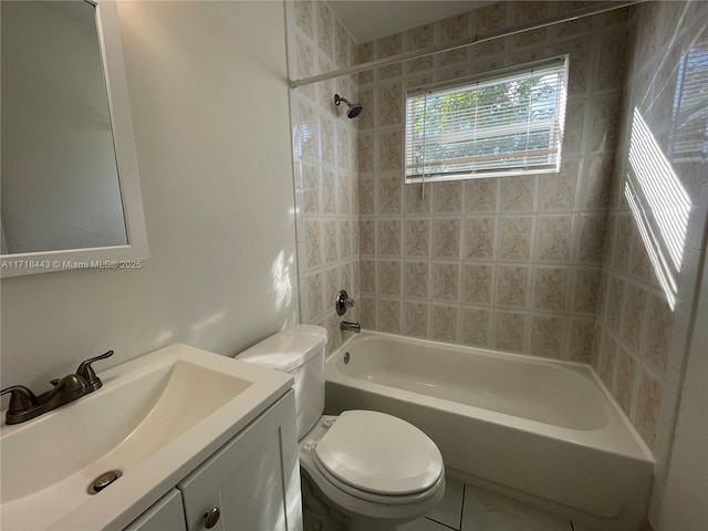 full bathroom with tile patterned floors, vanity, toilet, and tiled shower / bath