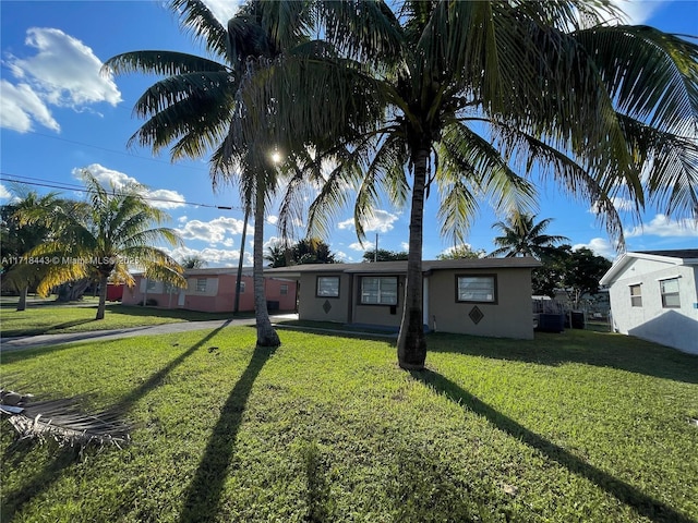 view of front of home with a front yard