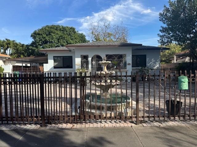 view of gate with a carport