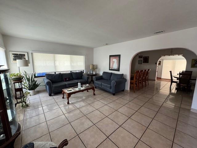 living room featuring light tile patterned floors