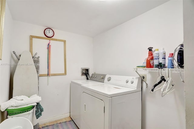 1800 S Ocean Blvd Unit 210, Lauderdale By The Sea, FL 33062 - laundry room featuring washing machine and dryer and light wood-type flooring