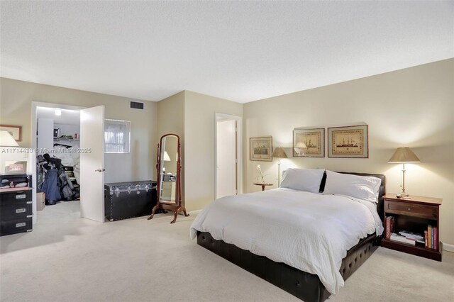 kitchen with dishwasher, white range, light hardwood / wood-style floors, and decorative light fixtures