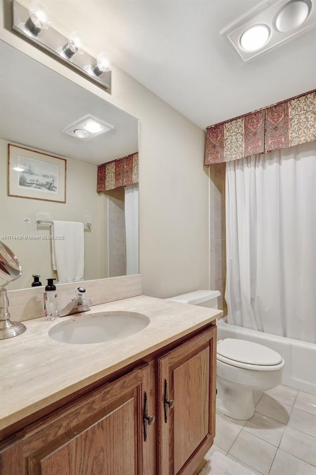 1800 S Ocean Blvd Unit 210, Lauderdale By The Sea, FL 33062 - full bathroom featuring vanity, shower / bathtub combination with curtain, tile patterned floors, and toilet