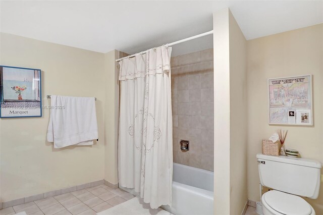 full bathroom with tile patterned flooring, vanity, shower / bathtub combination with curtain, and toilet