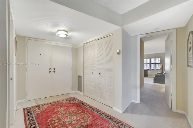 1800 S Ocean Blvd Unit 210, Lauderdale By The Sea, FL 33062 - entrance foyer featuring light carpet