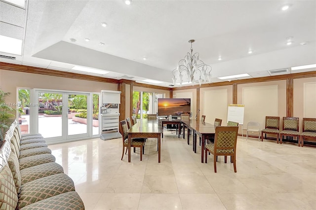 dining room featuring a tray ceiling and a notable chandelier