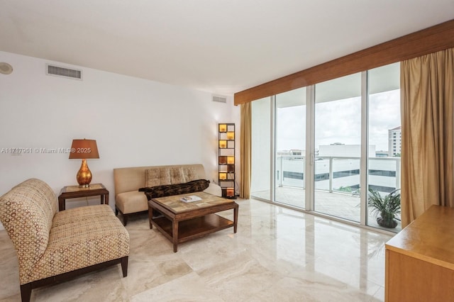 living room with a wall of windows