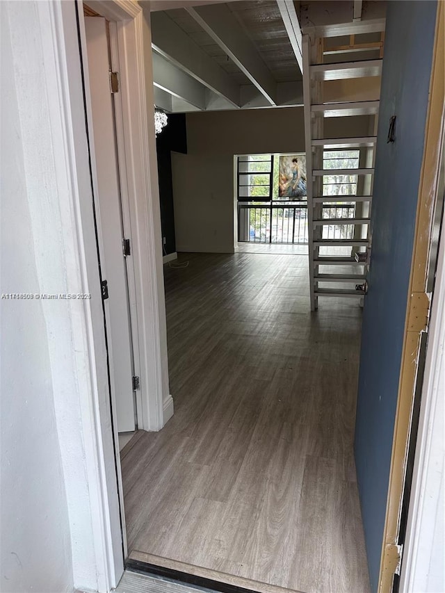 corridor featuring dark hardwood / wood-style floors