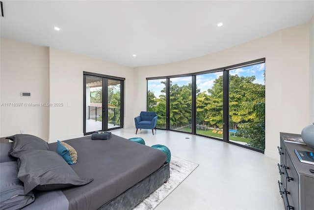 bedroom with access to outside and french doors