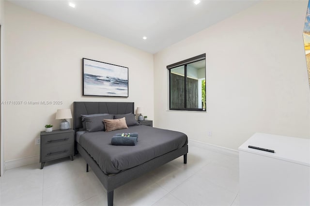 bedroom with light tile patterned flooring