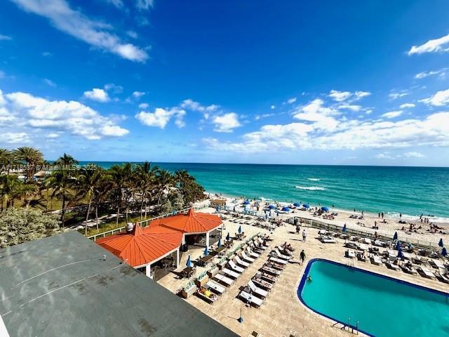 exterior space with a beach view