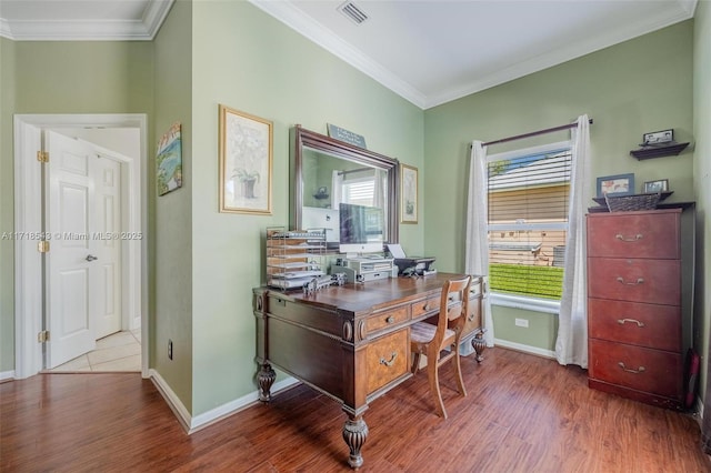 office featuring hardwood / wood-style floors and ornamental molding