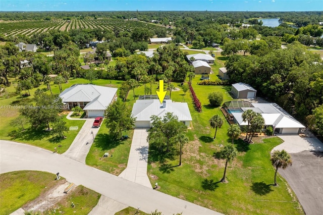 birds eye view of property featuring a rural view