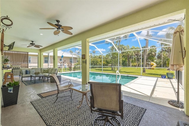 view of swimming pool featuring ceiling fan, an outdoor living space, a lanai, and a patio area