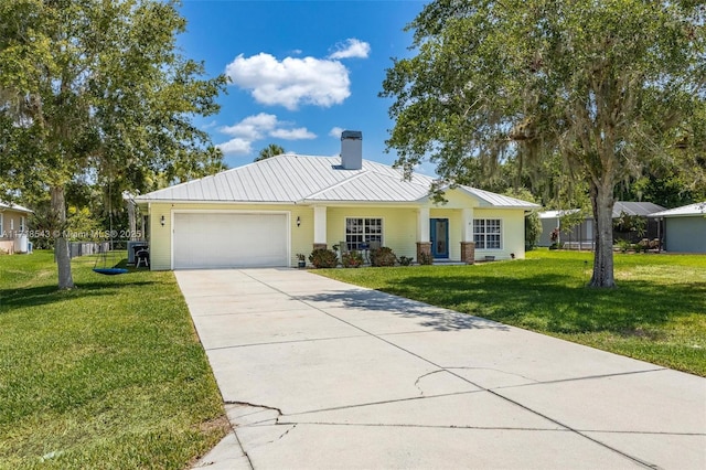 single story home with a garage and a front yard