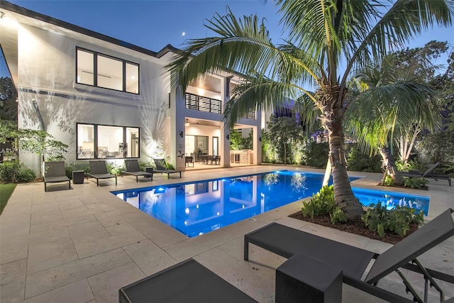 view of pool with a patio area