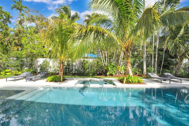 view of swimming pool featuring a patio area