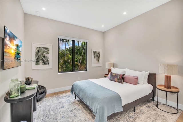 bedroom featuring light hardwood / wood-style floors