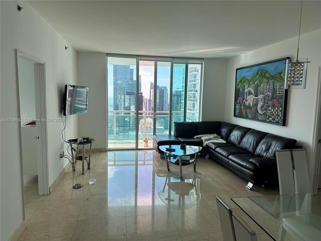 living room with floor to ceiling windows