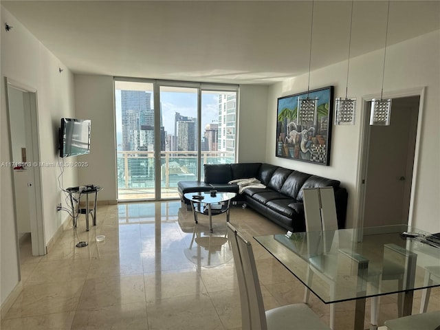 950 Brickell Bay Dr Unit 3505, Miami, FL 33131 - living area with baseboards and expansive windows