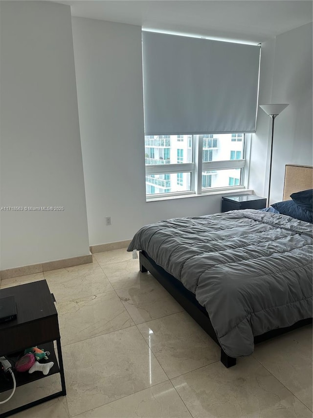 950 Brickell Bay Dr Unit 3505, Miami, FL 33131 - bedroom with marble finish floor and baseboards
