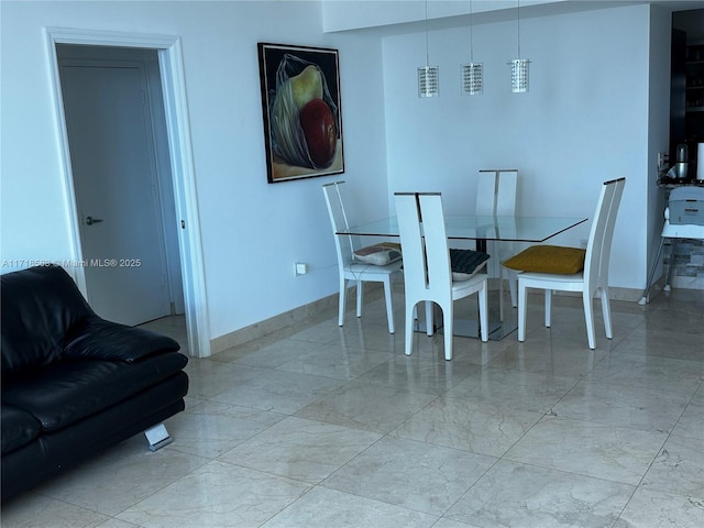 950 Brickell Bay Dr Unit 3505, Miami, FL 33131 - dining space with marble finish floor, baseboards, and visible vents