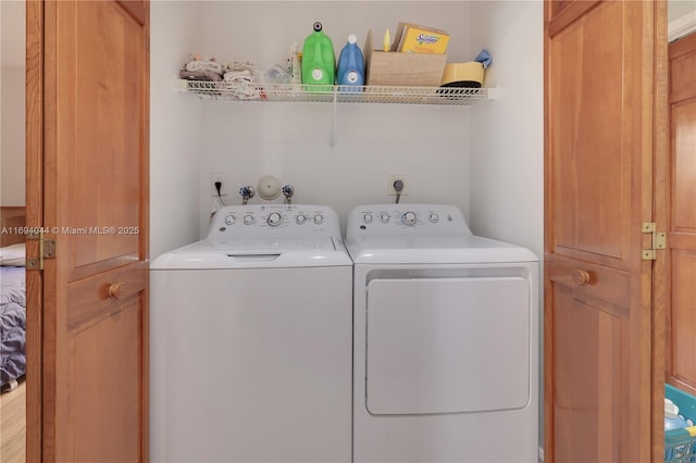 washroom with independent washer and dryer