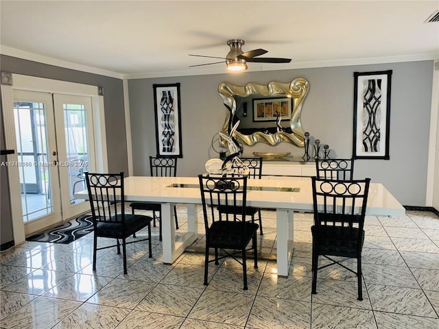 dining room with french doors, ceiling fan, and crown molding