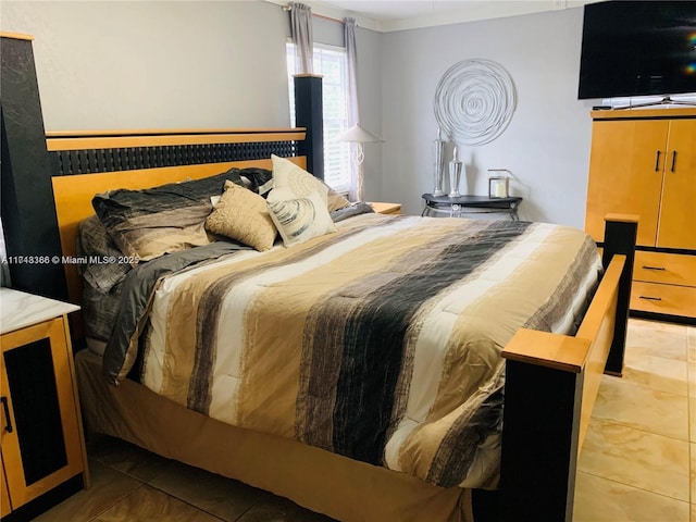 bedroom featuring crown molding